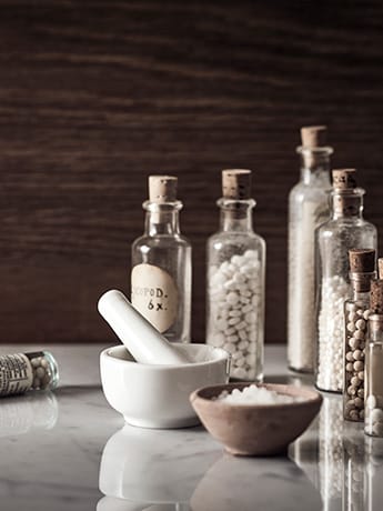 Homeopathy remedies in glass bottles
